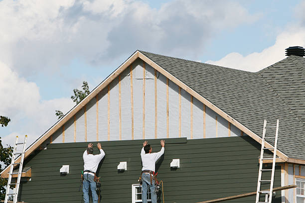 Professional Siding Repair technician working in Boston, IN